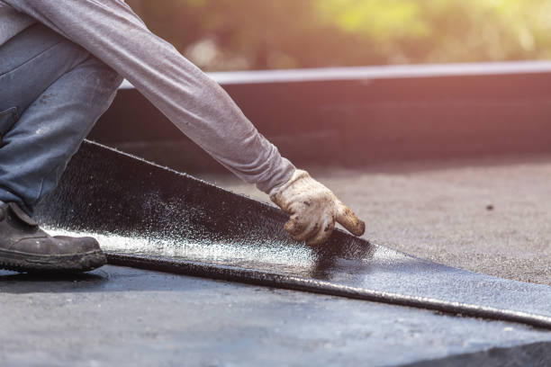 Professional Basement Waterproofing technician working in Ray, OH